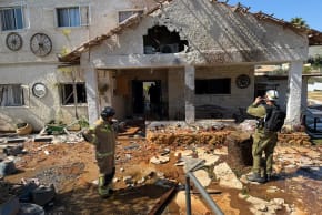 Emergency services respond to the scene of a Hezbollah missile strike in the northern Israel area on Tuesday, March 3, 2026.