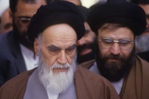 Ruhollah Khomeini (L) the leader and founder of Islamic Republic of Iran, looking frail votes for parliament election, in his residence Jamaran, in north Tehran 8th April 1988.