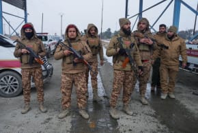 Members of the Syrian military police gather outside al-Aqtan prison, where some Islamic State detainees are held, in Raqqa, Syria January 22, 2026.