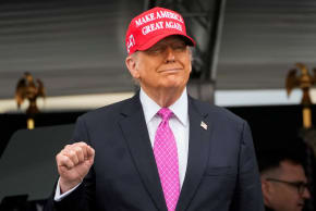 U.S. President Donald Trump wears a 'Make America Great Again' (MAGA) hat as he attends the commencement ceremony at West Point Military Academy in West Point, New York, U.S., May 24, 2025.