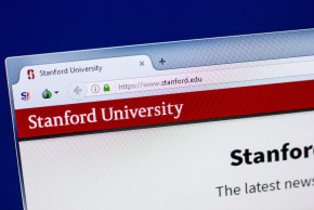 Homepage of Stanford University website on the display of PC.