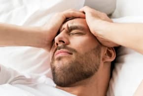  A man suffering from a headache 