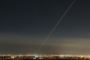 Anti-missile system fires interception missiles as missiles fired from Iran as it seen over central Israel, March 5, 2026.