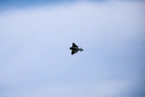 An aircraft flies near RAF Akrotiri, a British sovereign base that was hit by a drone early on Monday, causing limited damage, in Cyprus, March 6, 2026.