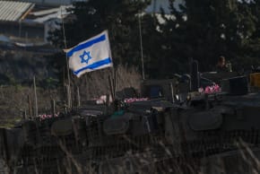 Israeli military vehicles and tanks are seen along the border with Lebanon, March 7, 2026