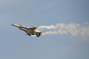 An Emirati Air Force F-16 performs a display flight at Al-Maktoum International Airport during the Dubai Airshow 2025 in Dubai, November 17, 2025