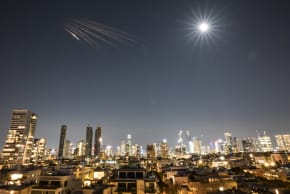 An Iranian missile with cluster munitions flies towards Israel, amid the U.S.-Israeli conflict with Iran, in central Israel, March 5, 2026.