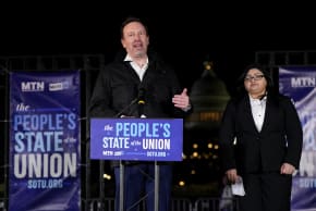US SEN. Chris Murphy (D–CT) speaks next to his guest Fereshteh Ganjavi, an Afghan refugee and founder of Elena’s Light, during the "People's State of the Union" event ahead President Trump's State of the Union address in Washington, DC, US, February 24, 2026. 