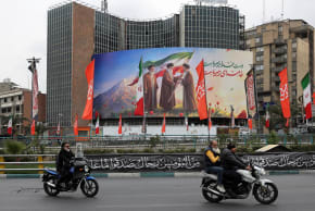 A banner of Iran's new supreme leader Mojtaba Khamenei with former supreme leaders Ali Khamenei and Ruhollah Khomeini, in Tehran, Iran, March 10, 2026