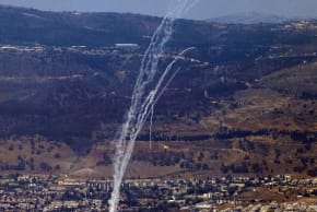 Rockets fired from southern Lebanon are intercepted by Israel's Iron Dome air defense system over the Upper Galilee region in northern Israel on August 9, 2024, amid ongoing cross-border clashes between Israeli troops and Hezbollah terrorists. 