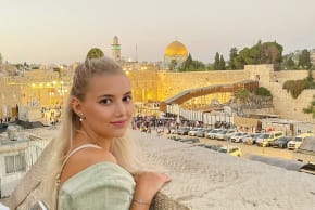 SHE HAS now chosen to live in Israel, studying political science at the Hebrew University of Jerusalem. Pictured: At the Western Wall, before the war.