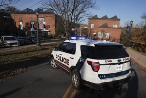 A law enforcement blocks access to the crime scene where 3 people were killed and 2 others wounded on the grounds of the University of Virginia on November 14, 2022 in Charlottesville, Virginia.