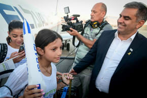 Minister of Immigration and Absorption Ofir Sofer seen with New immigrants from France arrive on a special " Aliyah Flight" at the Ben Gurion airport in central Israel on August 1, 2024.