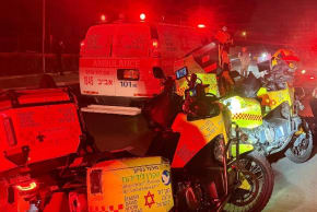 Emergency services respond to the scene of a teenage girl who was killed when she was hit by a car en route to shelter on March 12, 2026. 