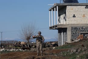 A TURKISH soldier stands guard as army and security personnel search a field after a piece of ammunition fell following the interception of a missile launched from Iran by a NATO air defence system, in Diyarbakir, Turkey, March 9, 2026.