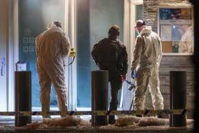 Police officers and technicians inspect the American embassy after a loud bang was reported at the site, in Oslo, Norway, March 8, 2026.