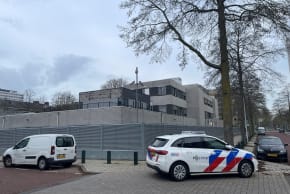 Vehicles outside a Jewish school following an explosion that caused minor damages, in Amsterdam, Netherlands, March 14, 2026.