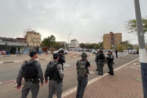 Authorities work at the scene of a fall in southern israel on March 14, 2026.
