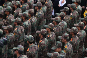 Revolutionary Guard Corps cadets attend the funeral of Razi Moussavi, a senior commander in the Quds Force of Iran's Islamic Revolutionary Guard Corps (IRGC) who was killed on December 25 in an Israeli strike in Syria, in Tehran, on December 28, 2023.