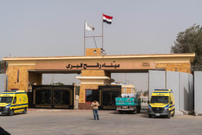 Ambulances stand at the border crossing on February 2, 2026 in Rafah, Egypt. (photo credit: Ali Moustafa/Getty Images)