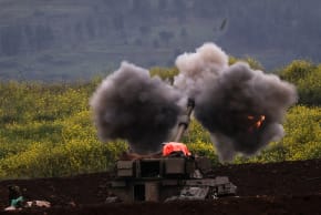 An Israeli artillery unit fires, amid escalation between Hezbollah and Israel, and amid the U.S.-Israeli conflict with Iran, on the Israeli side of the Israel-Lebanon border, March 15, 2026. 