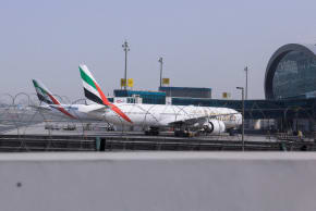 Planes are parked at Terminal 3 of the Dubai International Airport, following the United States and Israel strikes on Iran, in Dubai, United Arab Emirates, March 2, 2026. 