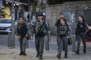 Israeli Border Police officers patrol outside Damascus Gate in Jerusalem’s Old City during the beginning of the holy fasting month of Ramadan, February 18, 2026.