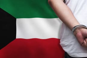 An illustration of a man in handcuffs with a Kuwaiti flag in the background.