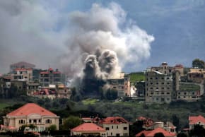 Smoke plumes rise following Israeli bombardment on the village of Khiam in southern Lebanon near the border with Israel, as seen from nearby Marjayoun, on March 16, 2026.