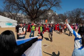 Pro-Israel demonstrators confront anti-Trump protesters during the "March 4 Democracy" rally on the National Mall on February 28, 2026 in Washington, DC. The protest was already scheduled before President Donald Trump announced that the United States and Israel had launched an attack on Iran. 