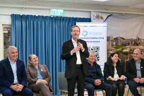 Herzog visits Jerusalem absorption center, hails wave of new immigrants. March 18, 2026.