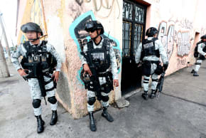 MEMBERS OF the National Guard guard the perimeter of the La Paz funeral home in Guadalajara, Jalisco state, Mexico, on March 1, 2026. 