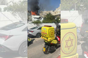 Magen David Adom paramedics respond to the scene of a fire after shrapnel fell on a Rehovot residence, March 20, 2026.