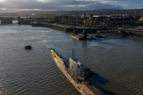  In this aerial view, the U-475 Black Widow, a former Soviet Navy submarine, lies moored in the River Medway on December 11, 2025 in Strood, England. 