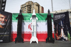 Symbolic mock-ups of Iranian missiles are displayed on a street, amid the U.S.-Israeli conflict with Iran, in Tehran, Iran, March 22, 2026.