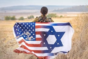 An IDF soldier holds a combined Israeli-American Flag (photo credit: SCREENSHOT/IDF SPOKESPERSON