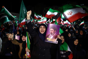 People attend an anti-US and Israeli rally, amid the US-Israeli conflict with Iran, in Tehran, Iran, March 22, 2026.