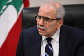 Lebanon's Prime Minister Nawaf Salam speaks to journalists working for foreign media and news agencies at the Government Palace in Beirut on December 3, 2025.