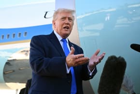 US President Donald Trump speaks to reporters before boarding Air Force One at Palm Beach International Airport on March 23, 2026 in West Palm Beach, Florida.