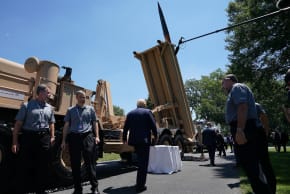 US President Donald Trump takes a look at a Lockheed Martin THAAD anti-ballistic missile launcher at the White House, July 15, 2019 