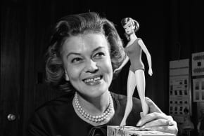 CLOTHING DESIGNER Charlotte Johnson with a 1965 Barbie doll.