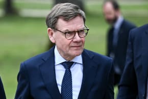 Germany's Foreign Minister Johann Wadephul walks during a G7 Foreign Ministers' meeting with Partner Countries at the Vaux-de-Cernay Abbey in Cernay-la-Ville outside Paris, on March 27, 2026.