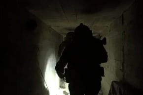 IDF soldiers operate inside an uncovered Hezbollah tunnel in southern Lebanon, March 27, 2026.