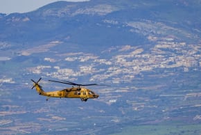 An Israeli military helicopter flies near the Israeli border with Lebanon, during the war with Iran and Hezbollah and ongoing missile fire toward Israel, March 28, 2026.
