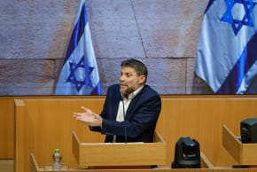 Finance Minister Bezalel Smotrich speaks at the Knesset plenum ahead of the 2026 state budget vote, March 30, 2026.