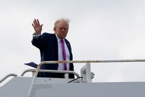US President Donald Trump waves as he boards Air Force One at Palm Beach International Airport in West Palm Beach, Florida, US, March 29, 2026.
