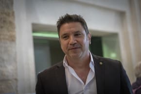 Omri Assenheim is seen following a hearing on his refusal to provide police with materials from a program he broadcast about Eli Feldstein, after the District Court ruled that journalistic privilege does not apply, at the Supreme Court in Jerusalem, March 30, 2026.