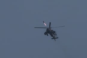 An Apache helicopter fires a missile toward Lebanon near the Israeli-Lebanese border in northern Israel, March 30, 2026.  (photo credit: AYAL MARGOLIN/FLASH90)