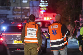 Israeli security and rescue forces operate at the scene where several people were lightly injured by a missile fired from Lebanon in Bi’ina, northern Israel, April 2, 2026.