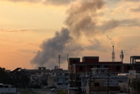 Smoke rises following an airstrike on a Popular Mobilization Forces (PMF) headquarters at Kirkuk International Airport, in Kirkuk, Iraq, March 28, 2026. (photo credit: AKO RASHEED/REUTERS)